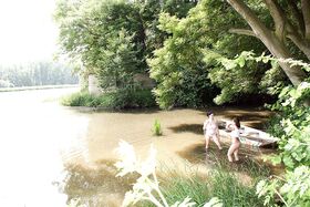 Shione and her busty lesbian friend toying each other by the river