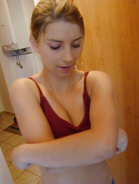 Stunning teen with huge natural tits slowly getting rid of her clothes
