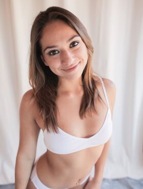 Brunette Latina Sara Luvv unveils her tiny boobies and spreads ass cheeks
