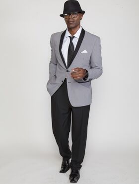 Ebony porn stud Sean Michaels posing suavely while wearing a classy suit