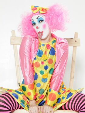 Busty pornstar Dana Vespoli gets her big tits fondled by pervert clowns