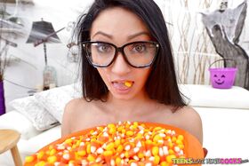 Eating popcorn ends up with some mouth fucking action for a teen in glasses