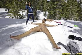 Naughty girl gets paid for making snow angels absolutely naked