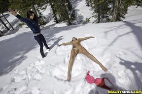 Naughty girl gets paid for making snow angels absolutely naked