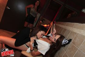 Drunk lesbian girlfriends havung fun, kissing and touching one another