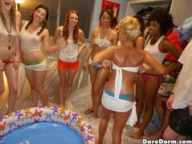 Lustful coeds spend some good time at the pool party in the dorm room