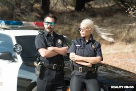 Blonde Spanish copper Bridgette B fucks a hot criminal on the cop car