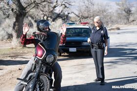 Blonde Spanish copper Bridgette B fucks a hot criminal on the cop car