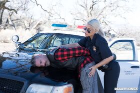 Blonde Spanish copper Bridgette B fucks a hot criminal on the cop car