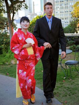 Japanese Geisha pleasures a white man she just met in a public park