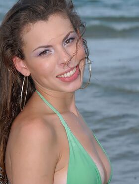 Hot latina Mary Jane showing her sexy bikini body on the beach
