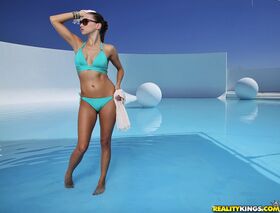 Lovely girl in glasses and bikini Celeste Star enjoys swimming in pool