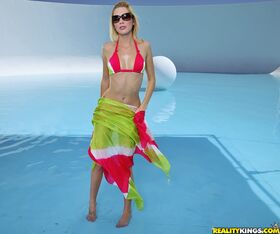 Horny babe in bikini and glasses Celeste star poses near azure pool