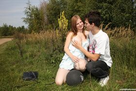 Big boobed teen girl and her boyfriend have sex among the tall grasses