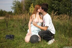 Big boobed teen girl and her boyfriend have sex among the tall grasses