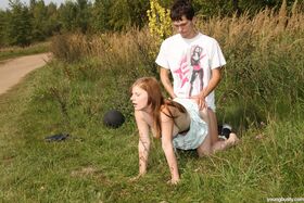 Big boobed teen girl and her boyfriend have sex among the tall grasses