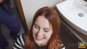 Stunning redhead giving phenomenal BJ and fucking in the public toilet