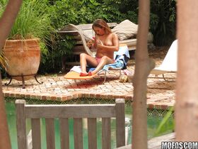 Sexy babe Stacey Hopkins gets watched by a voyeur tanning outdoor