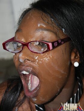 Nerdy ebony Taylor Starr gets her face and glasses covered in cum