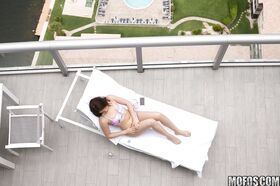 Brunette teen Kylie Quinn caught masturbating on balcony by voyeur