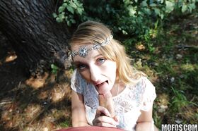 Hippy chick Harley Jade sucking off large cock in the forest