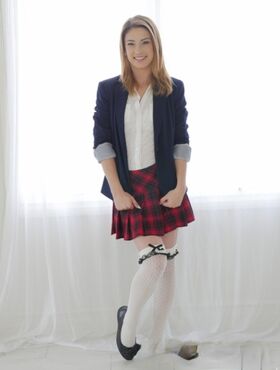 Solo girl Kristen Scott takes off her schoolgirl uniform except for her socks