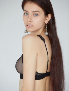 Blue-eyed Victoria Garin takes off her sheer lingerie to show her sweet tits