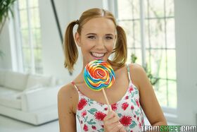 Petite teen Poppy Pleasure licks her lollipop before getting slammed