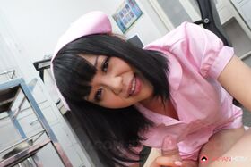 Dark haired Asian nurse Yui Nozomi kneels and gives head on the floor