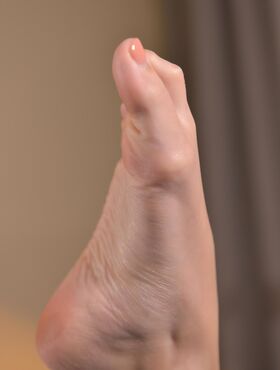 Beautiful long legged Clea Gaultier flaunts her perfect pink bare feet topless