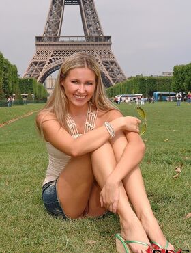 Leggy MILF Cherry Jul goes to Paris and gets off on no panty upskirt flashing