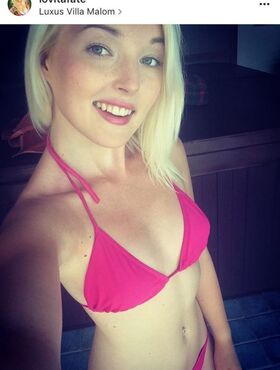 Hot blonde amateur Lovita Fate takes a self shot in hot lingerie & stockings