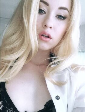 Beautiful blonde slut Misha Cross takes a selfie fully clothed and stark naked