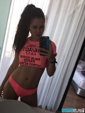Beautiful dark haired Julia in skimpy outfits taking a sexy selfie