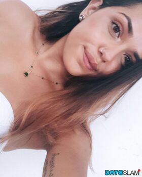 Sweet young brunette slut Esperanza poses topless for hard nipples selfie
