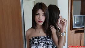 20 year old Thai ladyboy stripping for white tourist