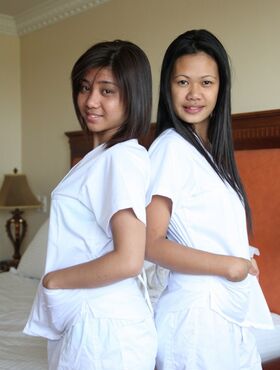 Lusty Filipina nurses Joanna and Joy display their sexy asses and pussies