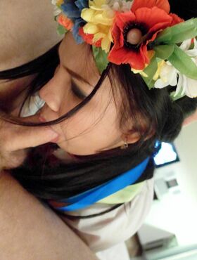 Asian female wears flowers in her hair during POV sex with a tourist