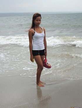 Ebony Filipina Mikaella reveals her slender naked body and gets jizzed