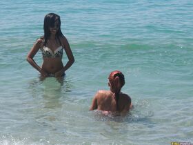 Hot little Asian sluts Shanelle & Bubbles pose & preen in skimpy beach outfits