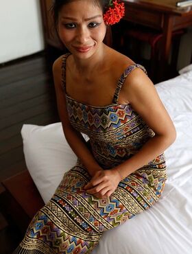 Thai MILF Sook takes a Farang's dick inside her hairy muff without a condom