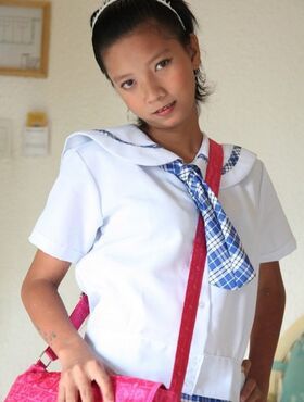 Petite Filipina schoolgirl Sally in uniform flashes panty upskirt & teen pussy