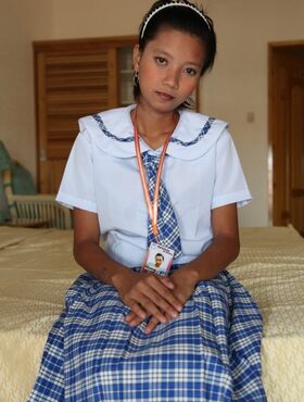 Petite Filipina schoolgirl Sally in uniform flashes panty upskirt & teen pussy
