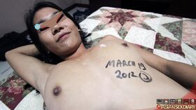 Asian amateur April sports a cum covered pussy after a POV fuck on a bed