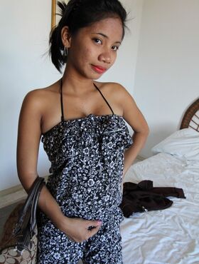 Slim Filipina female takes off her dress and sexy underthings to get naked