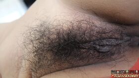 Fat Asian girl removes her white panties to get poked in her very hairy pussy