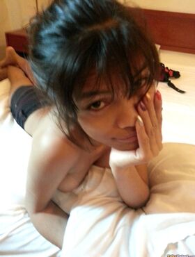Slim Filipina girl Jennifer bares her big tits prior to giving a BJ in motel