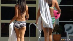 Thai hotties in sexy bikinis Nicole and Anne having fun at the pool