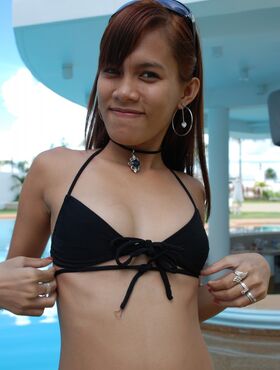 Filipina spinner Lucy teasing in bikini & stripping to show her tiny teen twat
