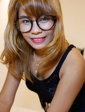 Nerdy Thai babe An happily takes a stiff cock in her tight hairy pussy